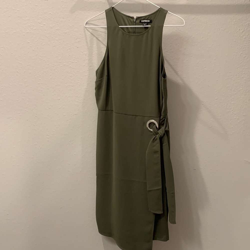 The army green midi dress is perfect for any dressy occasion. Fits true to size.